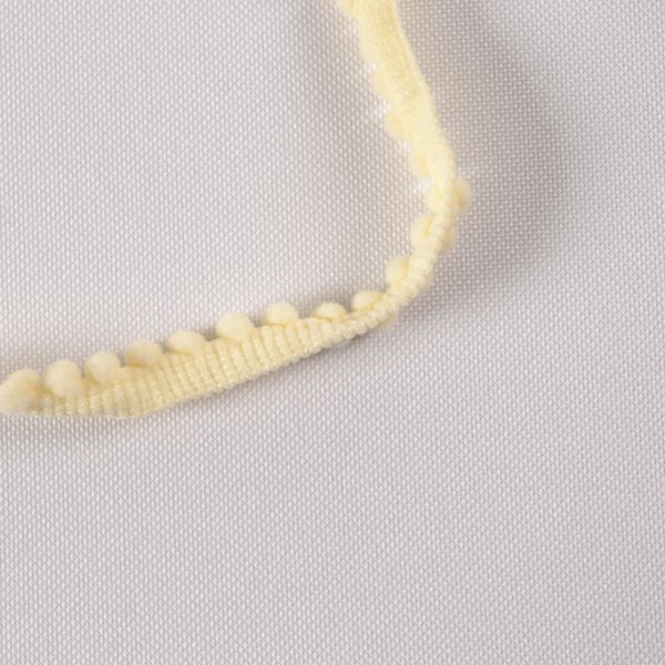 Bandă cu ciucuri 0,5cm culoare ecru / 18,5m